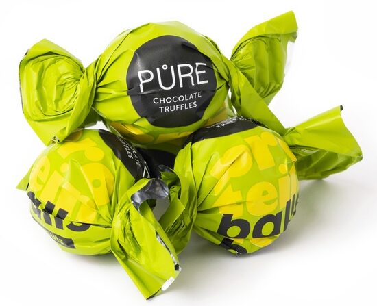 Tumšās šokolādes trifeles ar proteīna zemesriekstu krēma pildījumu 500g, PURE